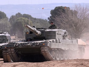Ukrainian military personnel receive armoured manoeuvre training on German-made Leopard 2 battle tanks at the Spanish army's training centre of San Gregorio in Zaragoza on March 13, 2023.