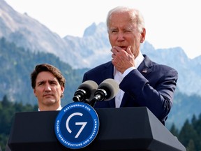 U.S. President Joe Biden, centre, speaks next to Prime Minister Justin Trudeau during the G7 leaders' summit in Germany, on June 26, 2022.