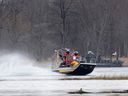 Firemen head back to shore from a search site in the marshland in Akwesasne, Quebec, Canada March 31, 2023. 