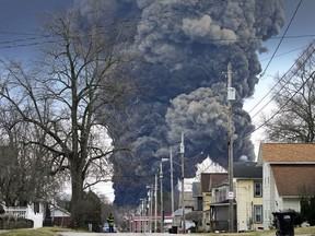 FILE - A plume rises over East Palestine, Ohio, as a result of the controlled detonation of a portion of the derailed Norfolk Southern trains, Feb. 6, 2023. After the catastrophic train car derailment in East Palestine, Ohio, some officials are raising concerns about a type of toxic substance that tends to stay in the environment.