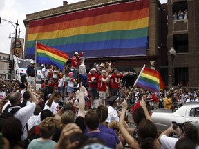FILE - The Stanley Cup makes an appearance during the Gay Pride Parade in Chicago, Sunday June 27, 2010. At least one National Hockey League team with a Russian player on its roster has decided against wearing special warmup jerseys to commemorate Pride Night because of a Russian law that expands restrictions on activities seen as promoting LGBTQ rights.