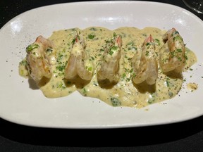 Seared shrimp with whiskey cream sauce at Cabotto’s in Stittsville.