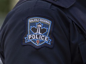 A Halifax Regional Police emblem is seen on a police officer in Halifax on July 2, 2020. Halifax police say a student was arrested after three people were stabbed this morning at a high school in the Bedford area.