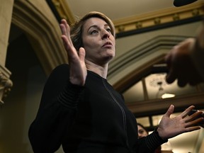 Minister of Foreign Affairs Melanie Joly speaks to reporters on Parliament Hill in Ottawa, on Wednesday, March 8, 2023. Joly says China's attempts to broker peace in Ukraine will likely only help Russia re-arm and prolong the conflict.