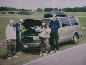 Stranded by the side of the road, temporarily as it turned out, were band members, left to right, Nat Resi, Michael Watson, Hannah Judge and Eric Graham.