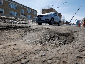 Potholes line parts of Richmond Road in Ottawa.