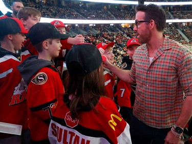 Actor Ryan Reynolds attending the Ottawa Senators game at the Canadian Tire Centre in Ottawa Thursday night. Ryan climbed over the wall of the box next to his to greet some young Senatror fans.