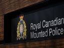 The RCMP logo is seen outside the force's 'E' division headquarters in Surrey, B.C., on Thursday, March 16, 2023. RCMP say officers have interviewed and have released a woman who was being sought in relation to a firearms complaint on Sipekne'katik First Nation in central Nova Scotia on Sunday night.