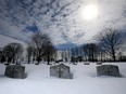 Some of the headstones at Beechwood Cemetery, particularly in the older military section, are almost completely covered in snow these days, the names of those interred below them temporarily hidden from view.