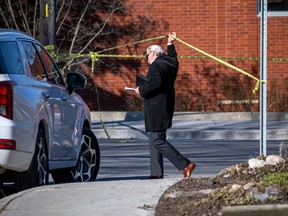 Ottawa police and the provincial Special Investigations Unit (SIU) at the site of an incident at the corner of Kirkwood Avenue and Richmond Road