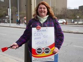 PSAC worker Leah D. picketing on Elgin Street.