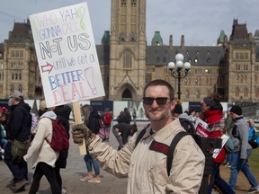 PSAC worker and ghostbuster Jeff Czuba picketing in front of Parliament Hill.