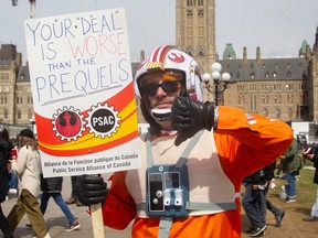 PSAC worker and X-Wing pilot Bob picketing on Parliament Hill.
