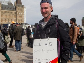 The sign of a striker PSAC worker on Parliament Hill carries a double-entendre.