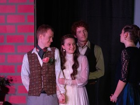 Algernon Moncrieff played by Daniel Kingdom (L), Cecily Cardew played by Adele Grootenboer (2nd FL), John “Jack” Worthing played by Joseph Carriere (2nd FR), and Lady Bracknell played by Caitlyn McPherson (R), during Redeemer Christian High School’s Cappies production of The Importance of Being Earnest, held on April 22, 2023.