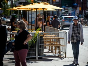 File photo: People were out enjoying the beautiful day along Elgin Street, Saturday, Sept. 18, 2021. We're putting together a list of which restaurants, so far, have opened their patios this spring.