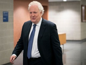 Former Quebec premier Jean Charest arrives at the Palais de Justice for the resumption of his civil trial on Wednesday September 28, 2022. Charest sued the Quebec government over UPAC leaks.