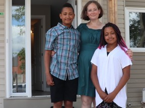 Anna Jowsey and her children Violet and Valentino In front of their townhouse in Orleans. Owning a home is more than just four walls and a roof. It’s about becoming part of a community and giving her children a safe and stable home.