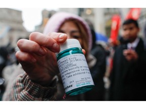 A reproductive rights organization in Mexico provides virtual guidance, as well as shipments of abortion pills, such as the medication being displayed here by an activist in New York City, for women who want to terminate a pregnancy on their own.