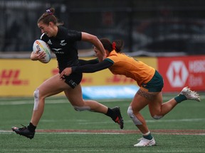 New Zealand's Jazmin Hotham tries to avoid tackle by Australia's Madison Ashby during the gold medal match on the final day of rugby action at the HSBC World Rugby Women's Sevens Series at Starlight Stadium in Langford, B.C., on Sunday, May 1, 2022. New Zealand continued its domination of the HSBC World Rugby Sevens Series on Sunday with both the men and women lifting the cup.