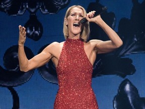 FILE - In this photo taken on September 18, 2019 Canadian singer Celine Dion performs on the opening night of her new world tour "Courage" at the Videotron Centre in Quebec City, Quebec.
