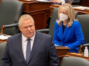 In this May 2021 photo, Kanata-Carleton MPP Merrilee Fullerton, then Ontario's Long-Term Care Minister, sat behind  Premier Doug Ford at Queen's Park in Toronto. Fullerton resigned as an MPP and minister in Ford's cabinet on March 31, 2023.