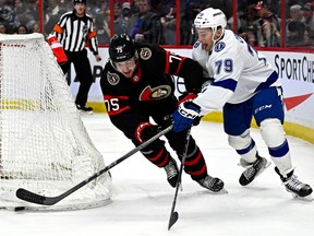 Ottawa Senators left wing Egor Sokolov (75) defends against Tampa Bay Lightning centre Ross Colton (79) during first period NHL hockey action in Ottawa, on Saturday, April 8, 2023.