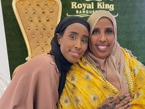 A family photo shows Hodan Hashi, left, and her mother, Anab Hirsi, at a family wedding in Toronto.