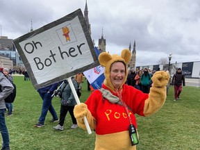 A person dressed as Winnie the Pooh marched on the PSAC picket line at Parliament Hill on Wednesday.