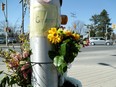 Flowers and a note to “Granny” adorn a post at the intersection of Bridge Street and Long Island Road in Manotick — the scene of a fatal accident Wednesday evening. One woman, 61, died and another 66-year-old woman remained in hospital with serious injuries on Thursday.