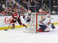 Cooper Foster (29) of the Ottawa 67's carries the puck in front of Ryan Gagnier (67) of the Oshawa Generals and behind the net guarded by Jacob Oster in Game 5 of an Ontario Hockey League playoff game in Gatineau, Que.