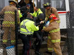 Ottawa's Confederation Line LRT system was shut down due to a "power issue" Wednesday as a freezing rain storm hit the capital in the morning. Ottawa firefighters and police helped riders off of an LRT train near Lees station before noon.