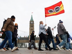 Hundreds of public servants were marching around Parliament Hill Wednesday as 155,000 Public Service Alliance of Canada (PSAC) members went on strike.