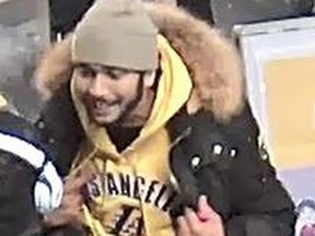 Ottawa police said they are looking to identify the pictured person after a man was injured in a swarming incident at the Rideau LRT station.