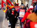 PSAC workers and supporters protested outside Treasury Board Chair Mona Fortier's office in Ottawa on April 21.