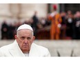 Pope Francis attends the Palm Sunday Mass in Saint Peter's Square at the Vatican, April 2, 2023. REUTERS/Guglielmo Mangiapane