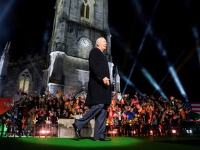 U.S. President Joe Biden walks onstage during an event at St. Muredach's Cathedral in Ballina, County Mayo, Ireland, April 14, 2023.
