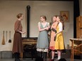 Kate Mundy played by Marjorie Mennie (L), Rose Mundy played by Ella Wattie (2nd FL), Agnes Mundy played by Maggie Boughner (2nd FR), and Christina Mundy played by Mycah Olson (R), during Almonte and District High School's Cappies production of Dancing at Lughnasa, held on April 23, 2023.