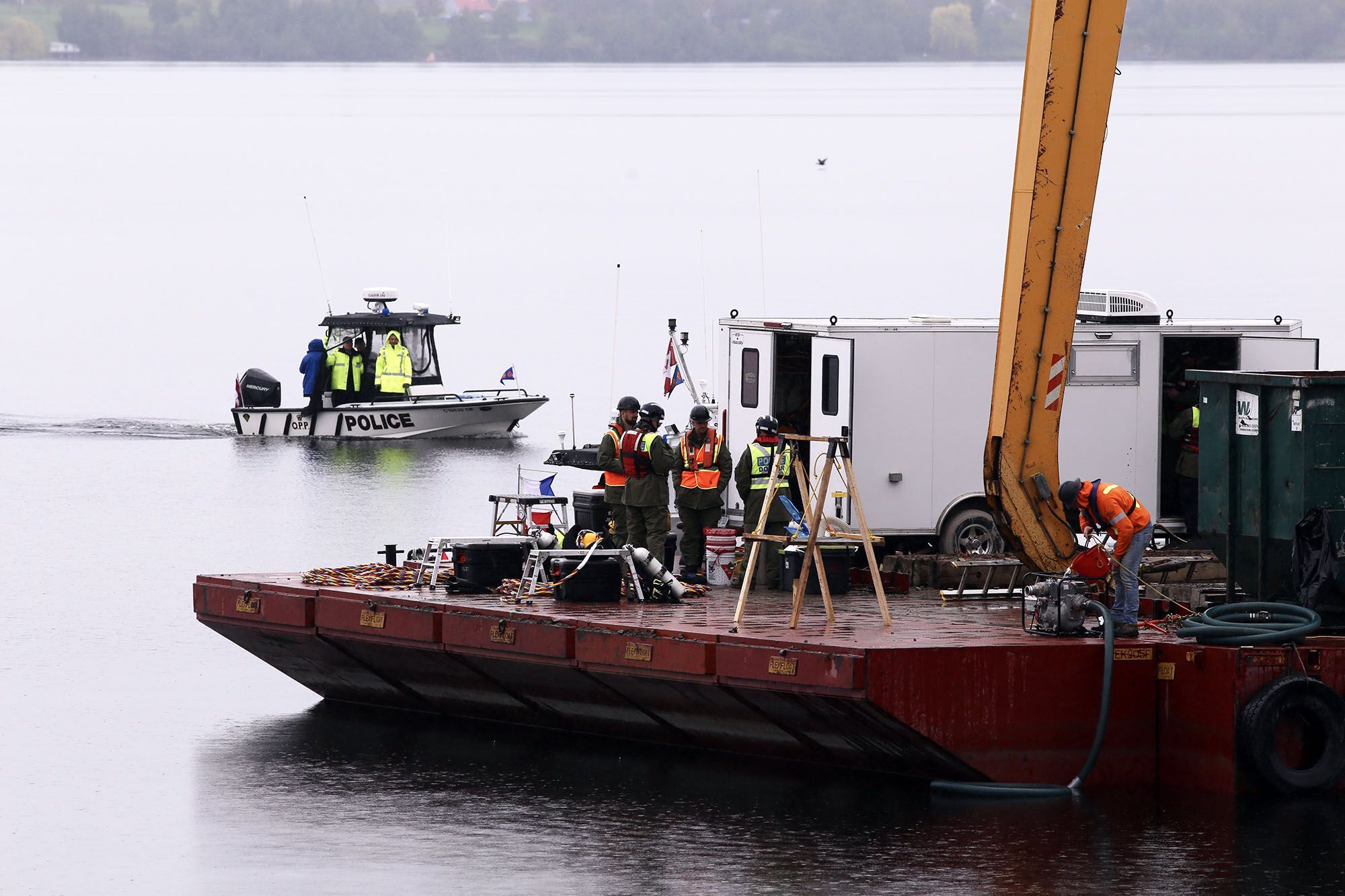 Human remains discovered inside car found submerged in lake at