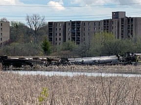 Emergency services on the scene of a train derailment near Bath Road in Kingston on Friday, May 5, 2023.