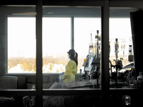 nurse looks outside while in the intensive care unit at the Humber River Hospital