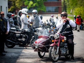 Steve Akeson was excited to get out and ride in the Distinguished Gentleman’s Ride event Sunday, dressed to impress with his dapper look, and side-car equipped bike.