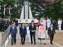Prime Minister Justin Trudeau and South Korea's Gyeonggi province governor Kim Dong-yeon (centre left) visit the Kapyong — or Gapyeong — Canada Monument, which commemorates the participation of Canada in the Korean War, on May 18, 2023.