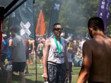 Runners cool down in a misting station in Confederation Park