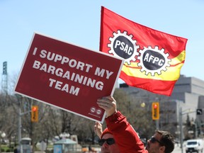 File photo: Public Service Alliance of Canada (PSAC) strikers on Elgin street in Ottawa, April 20, 2023. Several component unions under PSAC are in the process of identifying members who chose to cross the picket line during the recent strike.