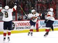 RALEIGH, NORTH CAROLINA - MAY 19: Matthew Tkachuk #19 of the Florida Panthers celebrates with his teammates after scoring the game winning goal on Frederik Andersen #31 of the Carolina Hurricanes in fourth overtime in Game One of the Eastern Conference Final of the 2023 Stanley Cup Playoffs at PNC Arena on May 19, 2023 in Raleigh, North Carolina.