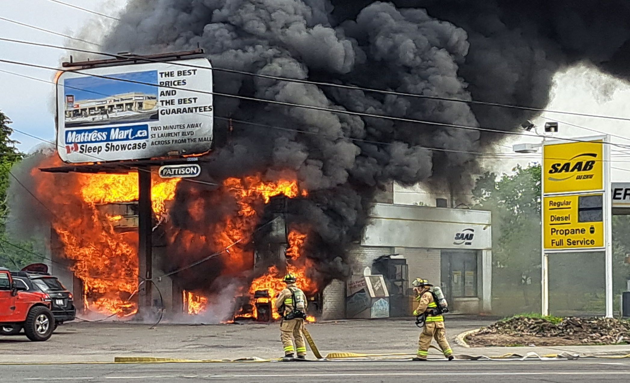 Firefighters Battle Flames At Gas Station On Cyrville Road Monday