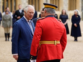 King Charles III meets with RCMP Commissioner Mike Duheme as he formally accepts the role of Commissioner-in-Chief of the RCMP during a ceremony in the quadrangle at Windsor Castle on April 28. Severing our constitutional ties to the King is virtually impossible.