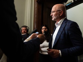 David Lametti, Minister of Justice and Attorney General of Canada, speaks to reporters after a caucus meeting on Parliament Hill in Ottawa, on Wednesday, May 10, 2023.