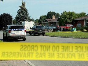A July 2021 file photo from the scene on Sherry Lane, where Christoper Avery Houghton had been stabbed to death.